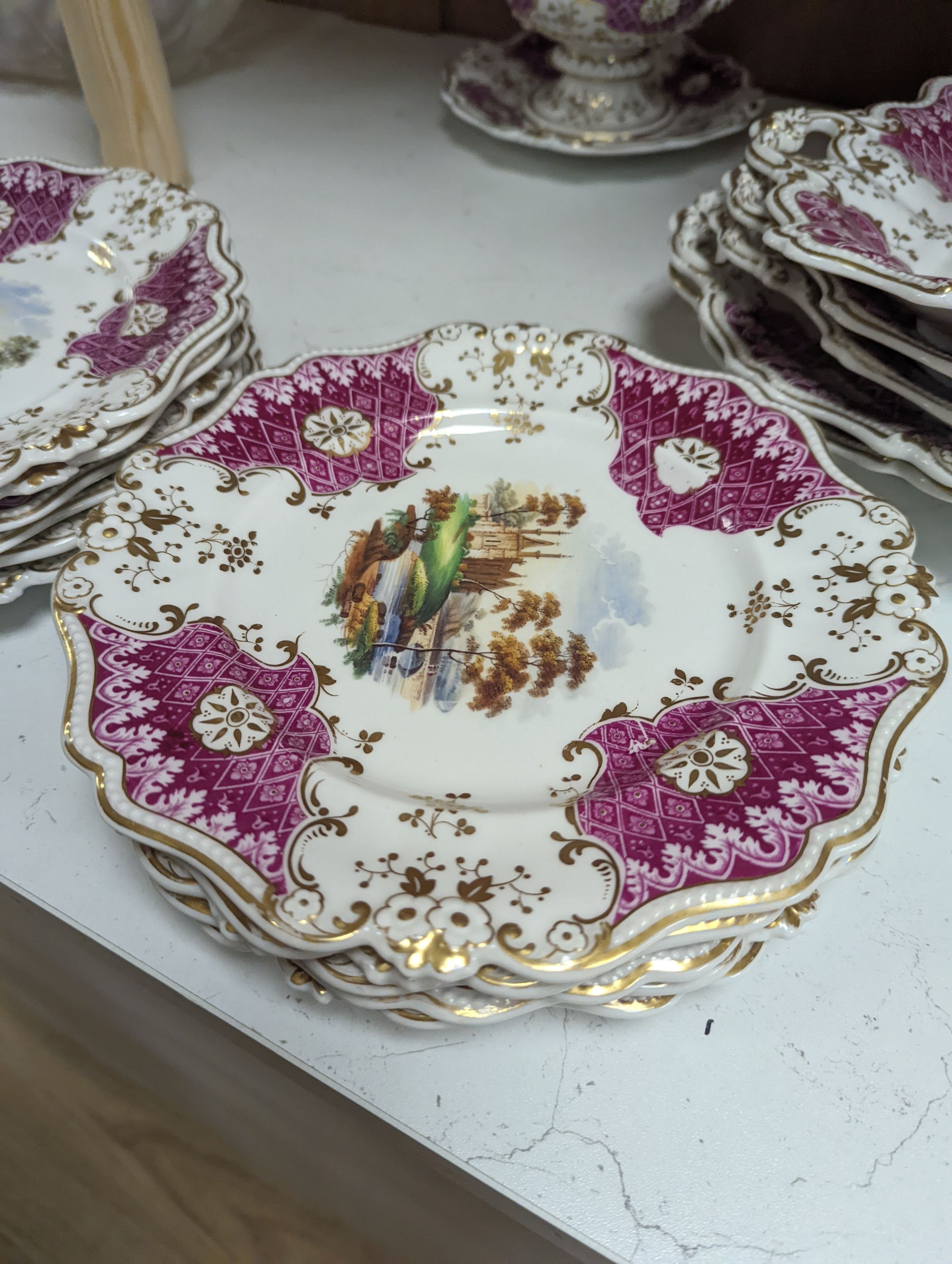 A Ridgways porcelain topographical part dessert service, c.1835, pattern number 2168, the sauce tureens and covers pattern number 2179